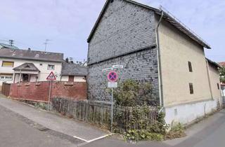 Grundstück zu kaufen in 65232 Taunusstein, Attraktives Baugrundstück gem. §34 BauGB mit Altbestand, Nebengebäuden, Garage, Scheune und Innenhof