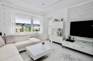 Wohnung kaufen in 24109 Melsdorf, Melsdorf - Top-modernisierte 3-Zimmerwohnung mit Gartenanteil und Garage