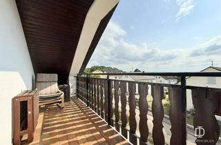 Wohnung kaufen in 86650 Wemding, Helle Dachgeschosswohnung mit Balkon, Außenstellplatz und Gartenanteil