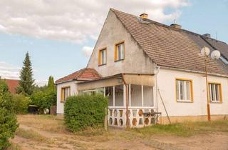 Doppelhaushälfte kaufen in 17268 Templin, Unsanierte Doppelhaushälfte mit Ofenheizung auf verwildertem 3.500 m2-Grundstück mit Wiese und Wald