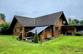 Haus kaufen in Scheelholz 2A, 23744 Schönwalde, Charmantes Holzhaus, 4 Zimmer Eck- Bungalow aus 2003 in grüner und zentraler Lage ( Provisionsfrei )