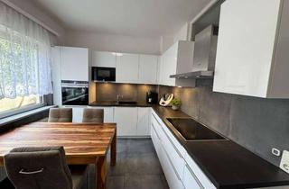 Wohnung kaufen in 63741 Damm, Helle & moderne 2-Etagen-Wohnung mit großem Außenbereich, Einbauküche & Keller- ruhig gelegen