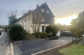 Haus kaufen in 42489 Wülfrath, Wohntraum mit Extras: EFH, vermietete Wohnung und Bauland mit Baugenehmigung