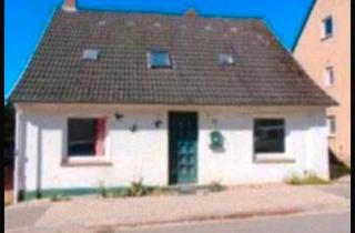 Haus kaufen in 30982 Pattensen, Pattensen - Zweifamilienhaus mit großem Garten, saniertem EG