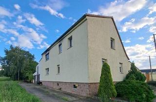 Einfamilienhaus kaufen in 06386 Osternienburger Land, Osternienburger Land - Sanierungsbedürftiges Einfamilienhaus mit großem Grundstück