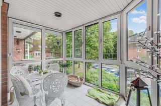 Wohnung kaufen in 24211 Preetz, Geräumige 4-Zimmer-Wohnung mit Kamin und Wintergarten