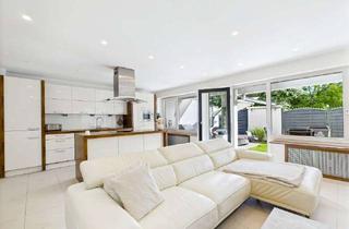 Wohnung kaufen in 65205 Nordenstadt, SCHICKE TERRASSENWOHNUNG MIT GARTEN, EINBAUKÜCHE UND TIEFGARAGENSTELLPLATZ