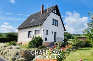 Einfamilienhaus kaufen in 37620 Halle, Gepflegtes Wohnhaus in Traumhafter Lage - Idyllisches Wohnen mit TOP-Ausblick in Halle!