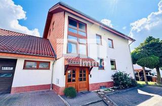 Haus kaufen in 34266 Niestetal, Zwei- bis Dreifamilienhaus + Großes Nebengebäude / Halle in gesuchter Lage