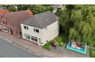 Haus kaufen in 26802 Moormerland, Renoviertes Zweifamilienhaus mit Wasserzugang!