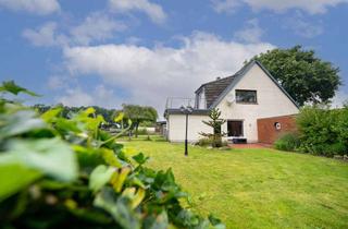 Einfamilienhaus kaufen in 24863 Börm, Börm: Einfamilienhaus mit Einliegerwohnung, Garagen und großem Garten