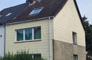 Doppelhaushälfte kaufen in 24148 Ellerbek, Doppelhaushälfte mit großem Garten, Keller und Garage