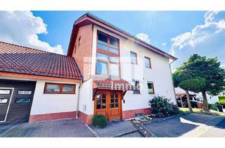 Anlageobjekt in 34266 Niestetal, Zwei- bis Dreifamilienhaus + Großes Nebengebäude / Halle in gesuchter Lage
