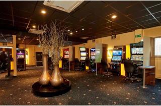 Anlageobjekt in 59174 Kamen, Spielhalle mit vier Wohnungen und zehn Stellplatze zu verkaufen