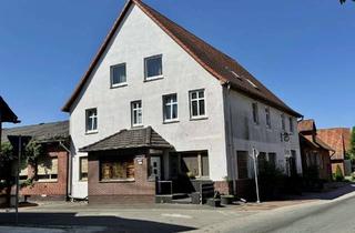 Mehrfamilienhaus kaufen in 32469 Petershagen, Mehrfamilienhaus mit profitablen Ausbaumöglichkeiten