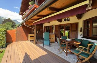 Wohnung kaufen in 83250 Marquartstein, Traumhafte 3-Zi.-Gartenwohnung mit 2 Bädern, Grundöfen, Erker, Gartenhaus, TG- und Außenstellplatz