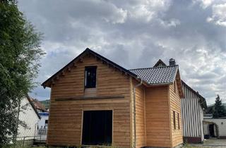 Haus kaufen in 38685 Langelsheim, Wohnen im Grünen - Holzbohlenhaus in Langelsheim