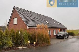 Einfamilienhaus kaufen in 26452 Sande, Sande - Einzigartige Gelegenheit: Modernisiertes Einfamilienhaus direkt am Wasser