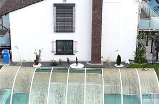 Einfamilienhaus kaufen in 35428 Langgöns, Langgöns - Saniertes Einfamilienhaus mit Einliegerwohnung, Pool