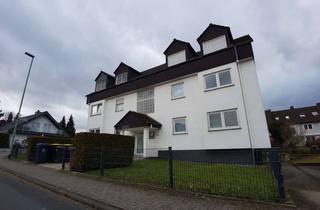 Wohnung kaufen in 61169 Friedberg, Helle 3-Zimmer-Dachgeschosswohnung mit Balkon, EBK und Garage in Friedberg