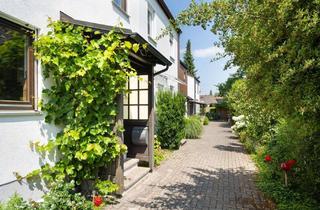 Haus kaufen in 85737 Ismaning, H&G - Idyllisches Reiheneckhaus für Familien mit Potenzial und reichlich Lebensqualität in Ismaning