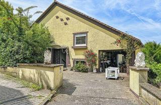 Einfamilienhaus kaufen in 61194 Niddatal, Einfamilienhaus mit viel Potenzial in ruhiger Lage am Feldrand in Niddatal