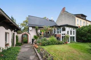 Haus kaufen in 14712 Rathenow, Mehrgenerationenhaus mit Gewerbeeinheit und Garage in Havelnähe