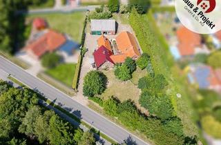 Haus kaufen in 26556 Utarp, Drei Wohneinheiten mit Potenzial – vielseitige Immobilie in Ostfriesland nahe der Nordsee