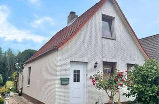 Einfamilienhaus kaufen in 25746 Heide, Verkauf eines Einfamilienhauses mit großzügigem Garten in Heide/Dithmarschen