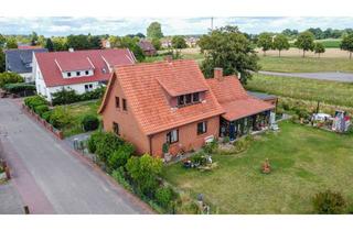 Haus kaufen in 49448 Lemförde, Wohngenuss mit Charme - gepflegtes Ein- bis Zweifamilienhaus mit Wintergarten