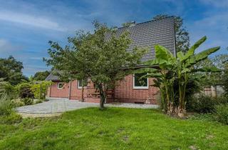 Einfamilienhaus kaufen in 27449 Kutenholz, Grünes Wohnglück: Freistehendes Einfamilienhaus mit Traumgarten am Waldrand