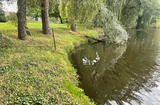 Haus kaufen in 06386 Osternienburger Land, Osternienburger Land - Wassergrundstück Seegrundstück über 4200 m2 direkt am Wasser