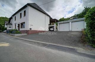 Haus kaufen in 53547 Leubsdorf, Zweifamilienhaus mit viel Potenzial in ruhiger Lage mit Doppelgarage und Garten