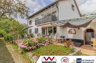 Haus kaufen in 85643 Steinhöring, Viel Platz und Komfort: Teilmodernisiertes Dreifamilienhaus in ruhiger Lage