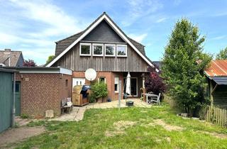 Haus kaufen in Weederedder, 24625 Negenharrie, Zweifamilienhaus mit idyllischem Grundstück und Solaranlage