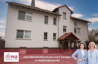 Mehrfamilienhaus kaufen in 34295 Edermünde, Zwei Wohnhäuser mit fünf Garagen auf einem Grundstück vereint