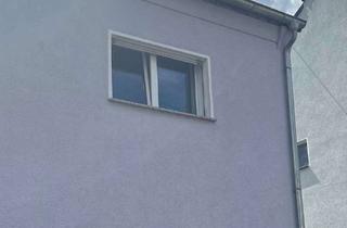 Doppelhaushälfte kaufen in 66333 Völklingen, Vermietete kleine Doppelhaushälfte in ruhiger Seitenstrasse mit schönem Weitblick in VK-Ludweiler zu