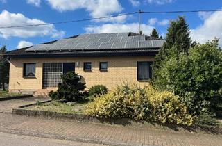 Haus kaufen in 66802 Überherrn, Schöner Winkelbungalow mit Ausbaupotential und Photovoltaikanlage in Überherrn zu verkaufen