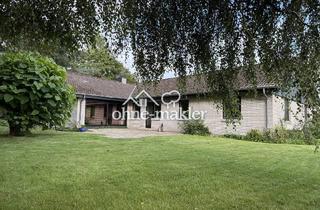 Einfamilienhaus kaufen in 24837 Schleswig, Großzügiger Winkelbungalow in Schleswig