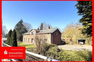 Haus kaufen in 23684 Scharbeutz, Zweifamilienhaus mit großzügigem Eigenlandgrundstück für Kapitalanleger oder Eigennutzer