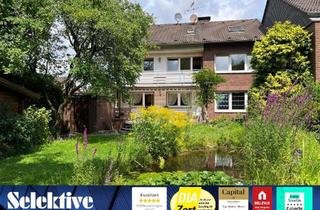 Haus kaufen in 47228 Bergheim, Top gelegenes Zweifamilienhaus mit tollem Grundstück direkt am Töppersee in Duisburg-Bergheim!
