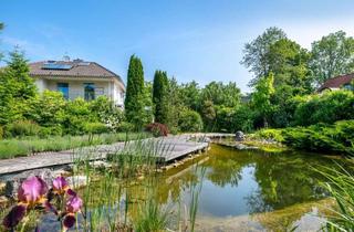 Einfamilienhaus kaufen in 82031 Grünwald, Klassische Ästhetik: Stilvolles Einfamilienhaus mit naturnah gestaltetem Traumgarten