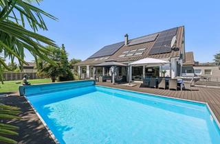 Villa kaufen in 66740 Saarlouis, Exklusive Architektenvilla mit Einliegerwohnung und Pool-Oase in Traumlage