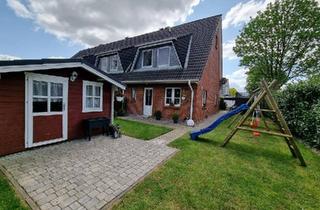 Reihenhaus kaufen in 23619 Hamberge, Hamberge - Modernes Endreihenhaus auf Eigenland