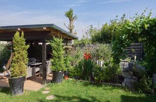 Wohnung kaufen in 83395 Freilassing, Charmante 4-Zimmer Gartenwohnung, langjähring vermietet, in zentraler Lage von Freilassing