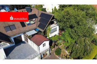 Einfamilienhaus kaufen in 35519 Rockenberg, Einfamilienhaus mit Einliegerwohnung und traumhaftem Weitblick in Rockenberg-Oppershofen.