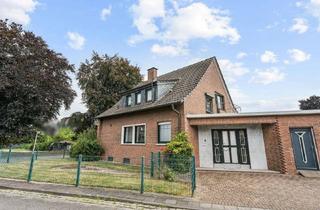 Einfamilienhaus kaufen in 46535 Dinslaken, Freistehendes Einfamilienhaus mit großem Garten in ruhiger Lage von Dinslaken