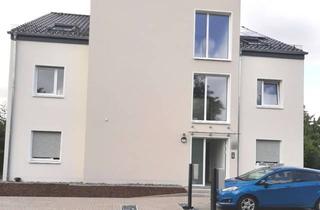 Wohnung kaufen in 33739 Jöllenbeck, Hochwertige Erdgeschosswohnung im Neubau KW 40 Haus