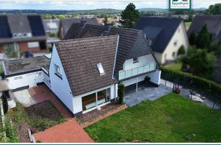 Wohnung kaufen in 49205 Hasbergen, Hasbergen - Lichtdurchflutete Wohnung mit Einfamilienhaus-Charme und Garten