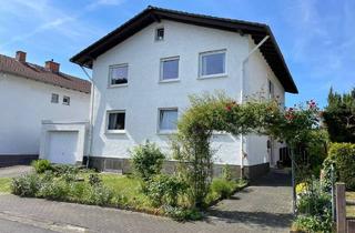 Haus kaufen in 35452 Heuchelheim, Heuchelheim - 35452 Heuchelheim Großes Wohnhaus mit Garage und Garten in toller Lage